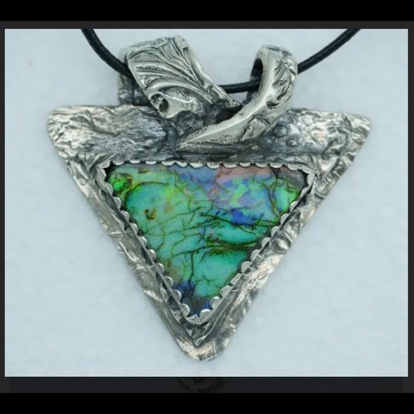 Monarch Opal pendant set in .975 Sterling Silver